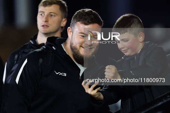 Murray McCallum of Newcastle Falcons takes a quick selfie with a fan before the Premiership Cup Group A match between Newcastle Falcons and...