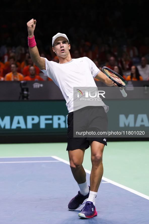 MALAGA, SPAIN - NOVEMBER 22: Daniel Altamaier of Team Germany celebrates a point during his singles match against Botic van de Zandschulp of...