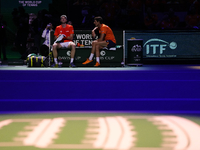 MALAGA, SPAIN - NOVEMBER 22: Botic van de Zandschulp of Team Netherlands and captain Paul Haarhuis during his singles match against Daniel A...