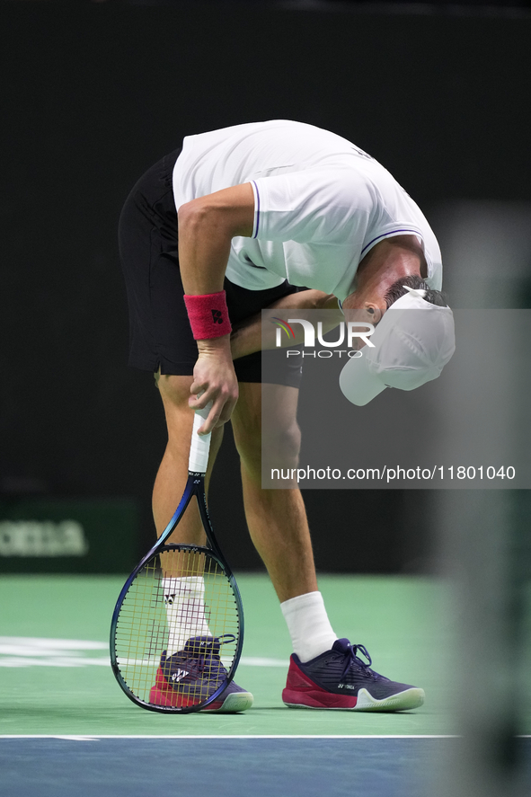 MALAGA, SPAIN - NOVEMBER 22: Daniel Altamaier of Team Germany injured during his singles match against Botic van de Zandschulp of Team Nethe...