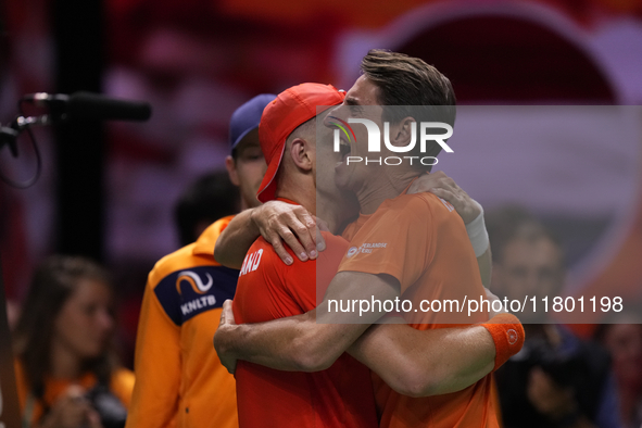 MALAGA, SPAIN - NOVEMBER 22: Tallon Griekspoor of Team Netherlands celebrates the victory with his captain 
Paul Haarhuis after winning his...