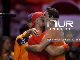 MALAGA, SPAIN - NOVEMBER 22: Tallon Griekspoor of Team Netherlands celebrates the victory with his captain 
Paul Haarhuis after winning his...