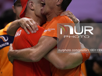 MALAGA, SPAIN - NOVEMBER 22: Tallon Griekspoor of Team Netherlands celebrates the victory with his captain 
Paul Haarhuis after winning his...