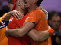 MALAGA, SPAIN - NOVEMBER 22: Tallon Griekspoor of Team Netherlands celebrates the victory with his captain 
Paul Haarhuis after winning his...