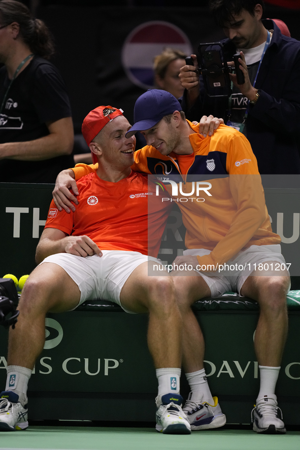 MALAGA, SPAIN - NOVEMBER 22: Tallon Griekspoor of Team Netherlands celebrates the victory with Botic van de Zandschulp after winning his sin...