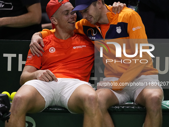 MALAGA, SPAIN - NOVEMBER 22: Tallon Griekspoor of Team Netherlands celebrates the victory with Botic van de Zandschulp after winning his sin...