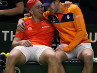 MALAGA, SPAIN - NOVEMBER 22: Tallon Griekspoor of Team Netherlands celebrates the victory with Botic van de Zandschulp after winning his sin...