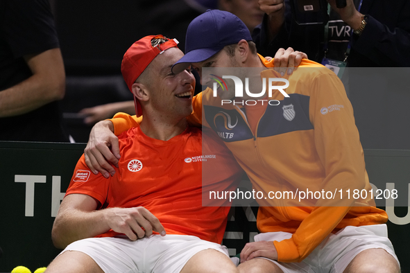 MALAGA, SPAIN - NOVEMBER 22: Tallon Griekspoor of Team Netherlands celebrates the victory with Botic van de Zandschulp after winning his sin...