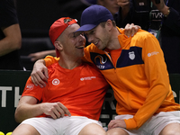 MALAGA, SPAIN - NOVEMBER 22: Tallon Griekspoor of Team Netherlands celebrates the victory with Botic van de Zandschulp after winning his sin...