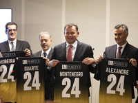 Prime Minister Luis Montenegro wears a T-shirt with his last name during the inauguration of the Prof. Dr. Jayme Rios Souza Stadium, Univers...