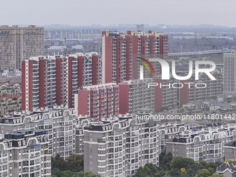 The photo shows real estate in the urban area of Huai 'an City, Jiangsu Province, China, on November 18, 2024. (