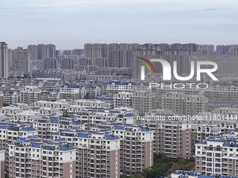 The photo shows real estate in the urban area of Huai 'an City, Jiangsu Province, China, on November 18, 2024. (