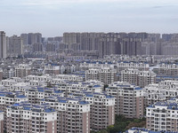 The photo shows real estate in the urban area of Huai 'an City, Jiangsu Province, China, on November 18, 2024. (