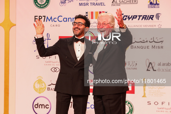 Movie stars Ahmed Helmy and Hassen Fahmy are on the red carpet at the conclusion of the Cairo Film Festival in its 45th session, held at the...