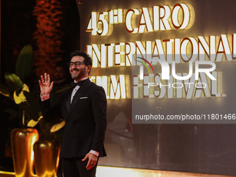 Movie star Ahmed Helmy is on the red carpet at the conclusion of the Cairo Film Festival in its 45th session, held at the Egyptian Opera Hou...