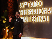 Movie star Ahmed Helmy is on the red carpet at the conclusion of the Cairo Film Festival in its 45th session, held at the Egyptian Opera Hou...