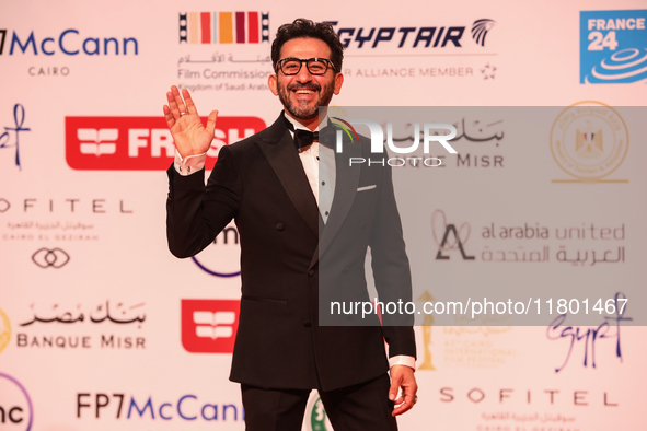 Movie star Ahmed Helmy is on the red carpet at the conclusion of the Cairo Film Festival in its 45th session, held at the Egyptian Opera Hou...