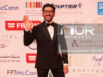 Movie star Ahmed Helmy is on the red carpet at the conclusion of the Cairo Film Festival in its 45th session, held at the Egyptian Opera Hou...