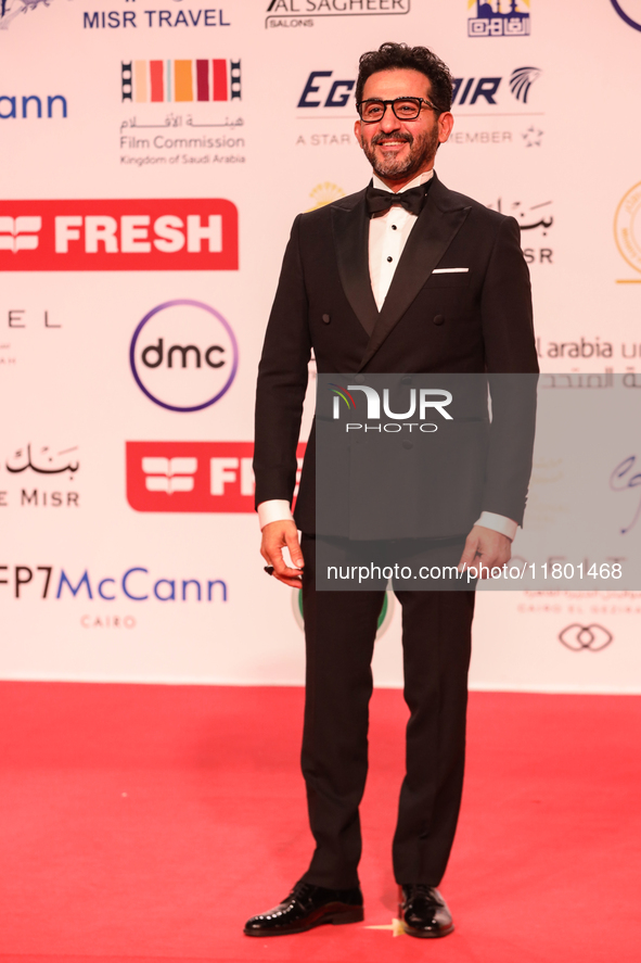 Movie star Ahmed Helmy is on the red carpet at the conclusion of the Cairo Film Festival in its 45th session, held at the Egyptian Opera Hou...