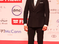 Movie star Ahmed Helmy is on the red carpet at the conclusion of the Cairo Film Festival in its 45th session, held at the Egyptian Opera Hou...