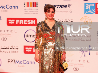 Movie star Alham Shahen is on the red carpet at the conclusion of the Cairo Film Festival in its 45th session, held at the Egyptian Opera Ho...