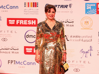 Movie star Alham Shahen is on the red carpet at the conclusion of the Cairo Film Festival in its 45th session, held at the Egyptian Opera Ho...