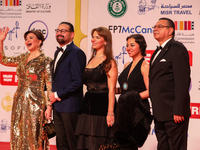 Movie star Alham Shahen and her family stand on the red carpet at the conclusion of the Cairo Film Festival in its 45th session, held at the...