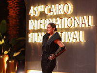 Movie star Amina Khalil is on the red carpet at the conclusion of the Cairo Film Festival in its 45th session, held at the Egyptian Opera Ho...