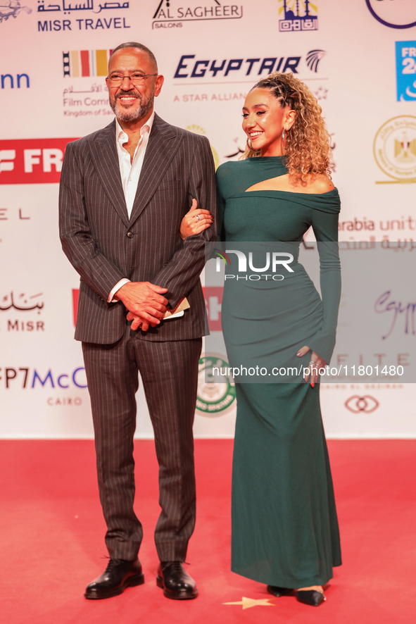 Movie star Ashraf Abdelbaky and his daughter are on the red carpet at the conclusion of the Cairo Film Festival in its 45th session, held at...