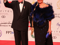 Movie stars Hassen Fahmi and Youssra walk the red carpet at the conclusion of the Cairo Film Festival in its 45th session, held at the Egypt...