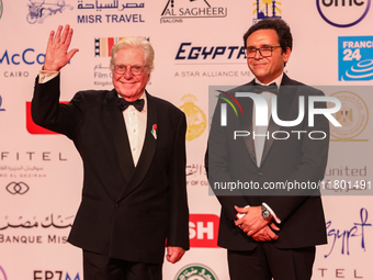 Movie stars Hassen Fahmiii and the Egyptian Minister of Culture stand on the red carpet at the conclusion of the Cairo Film Festival in its...