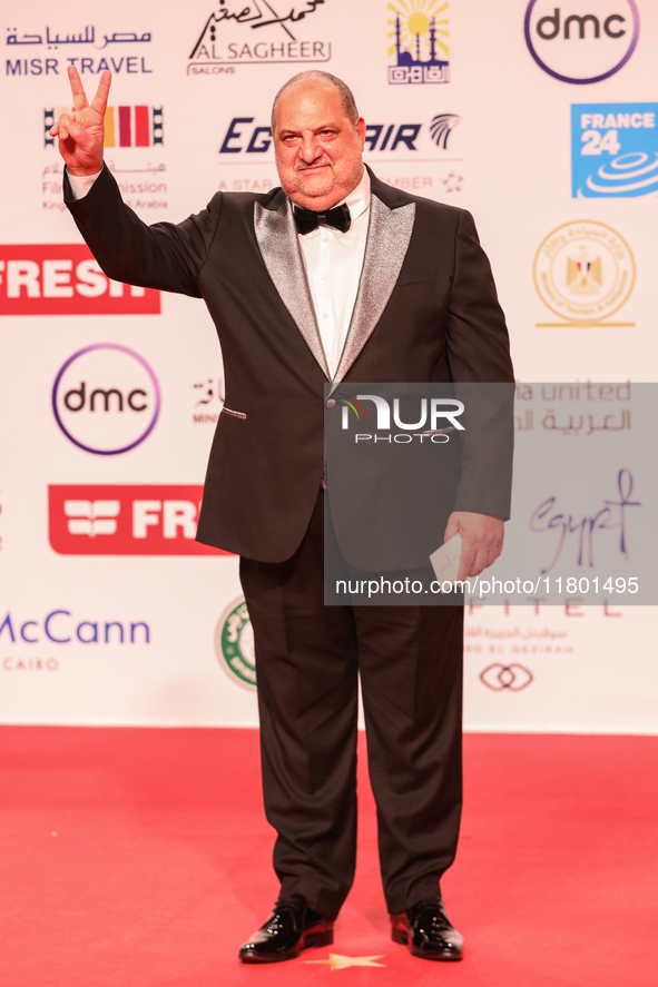 Movie star Khaled El Savy is on the red carpet at the conclusion of the Cairo Film Festival in its 45th session, held at the Egyptian Opera...