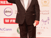 Movie star Khaled El Savy is on the red carpet at the conclusion of the Cairo Film Festival in its 45th session, held at the Egyptian Opera...