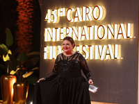 Movie star Mimi Gamal is on the red carpet at the conclusion of the Cairo Film Festival in its 45th session, held at the Egyptian Opera Hous...