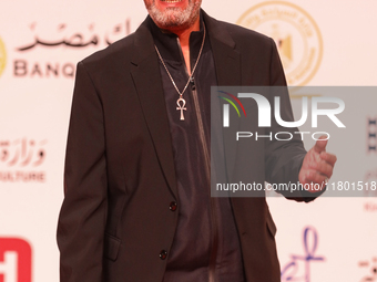 Movie star Sabry Fawwaz is on the red carpet at the conclusion of the Cairo Film Festival in its 45th session, held at the Egyptian Opera Ho...