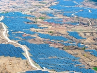 The photovoltaic power array area is on the barren hills on both sides of the rural road in Anqiu, China, on November 22, 2024. (