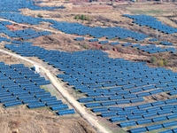 The photovoltaic power array area is on the barren hills on both sides of the rural road in Anqiu, China, on November 22, 2024. (