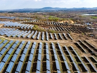 The photovoltaic power array area is on the barren hills on both sides of the rural road in Anqiu, China, on November 22, 2024. (