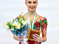 Gold medalist Mariia Borisova of Russia celebrates on the podium after the Individual Rope Final of the International Rhythmic Gymnastics To...