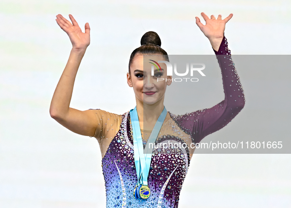 Gold medalists Team Uzbekistan (center) and silver medalist Team ROTC (left) from Belarus participate in the clubs final of the Internationa...