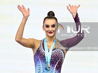 Gold medalists Team Uzbekistan (center) and silver medalist Team ROTC (left) from Belarus participate in the clubs final of the Internationa...