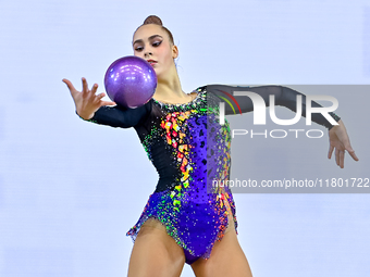 Natalya Usova of Uzbekistan competes in the Ball final of the International Rhythmic Gymnastics Tournament ''Sky Grace 2024'' at Aspire Zone...