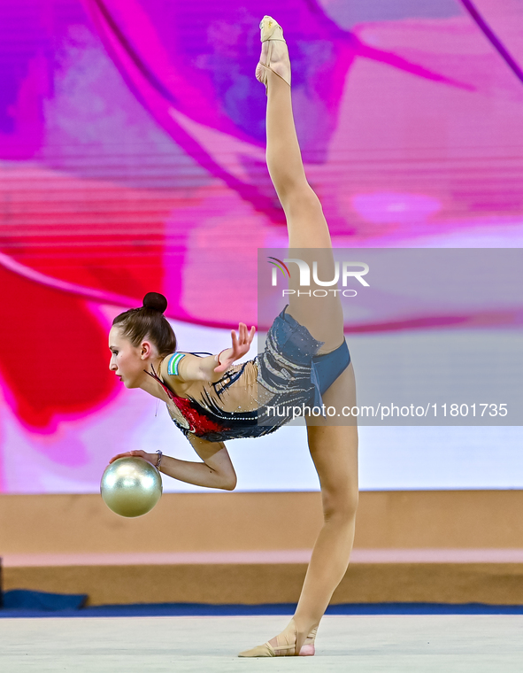 Takhmina Ikromova of Uzbekistan competes in the Ball final of the International Rhythmic Gymnastics Tournament 'Sky Grace 2024' at Aspire Zo...