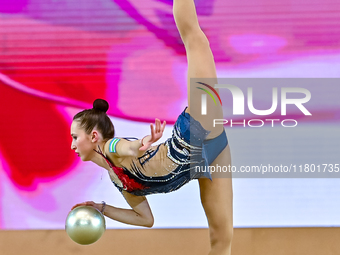 Takhmina Ikromova of Uzbekistan competes in the Ball final of the International Rhythmic Gymnastics Tournament 'Sky Grace 2024' at Aspire Zo...