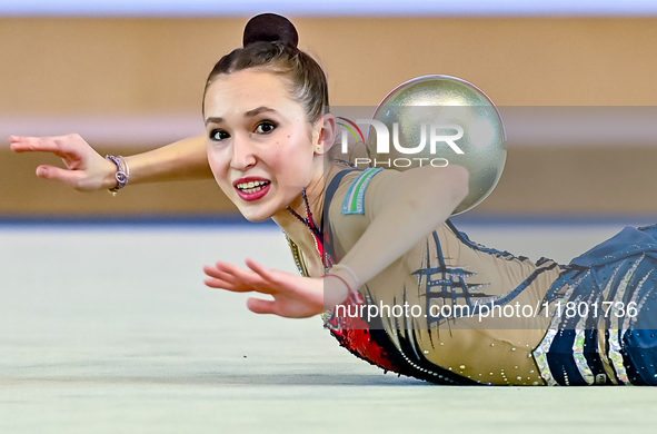 Takhmina Ikromova of Uzbekistan competes in the Ball final of the International Rhythmic Gymnastics Tournament 'Sky Grace 2024' at Aspire Zo...