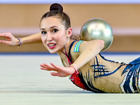 Takhmina Ikromova of Uzbekistan competes in the Ball final of the International Rhythmic Gymnastics Tournament 'Sky Grace 2024' at Aspire Zo...