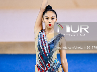 Aibota Yertaikyzy of Kazakhstan competes in the Hoop final of the International Rhythmic Gymnastics Tournament 'Sky Grace 2024' at Aspire Zo...