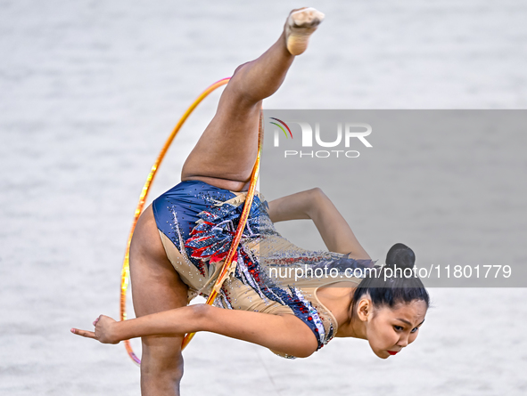 Aibota Yertaikyzy of Kazakhstan competes in the Hoop final of the International Rhythmic Gymnastics Tournament 'Sky Grace 2024' at Aspire Zo...