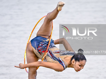 Aibota Yertaikyzy of Kazakhstan competes in the Hoop final of the International Rhythmic Gymnastics Tournament 'Sky Grace 2024' at Aspire Zo...