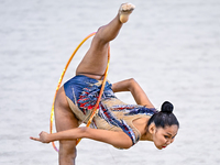 Aibota Yertaikyzy of Kazakhstan competes in the Hoop final of the International Rhythmic Gymnastics Tournament 'Sky Grace 2024' at Aspire Zo...